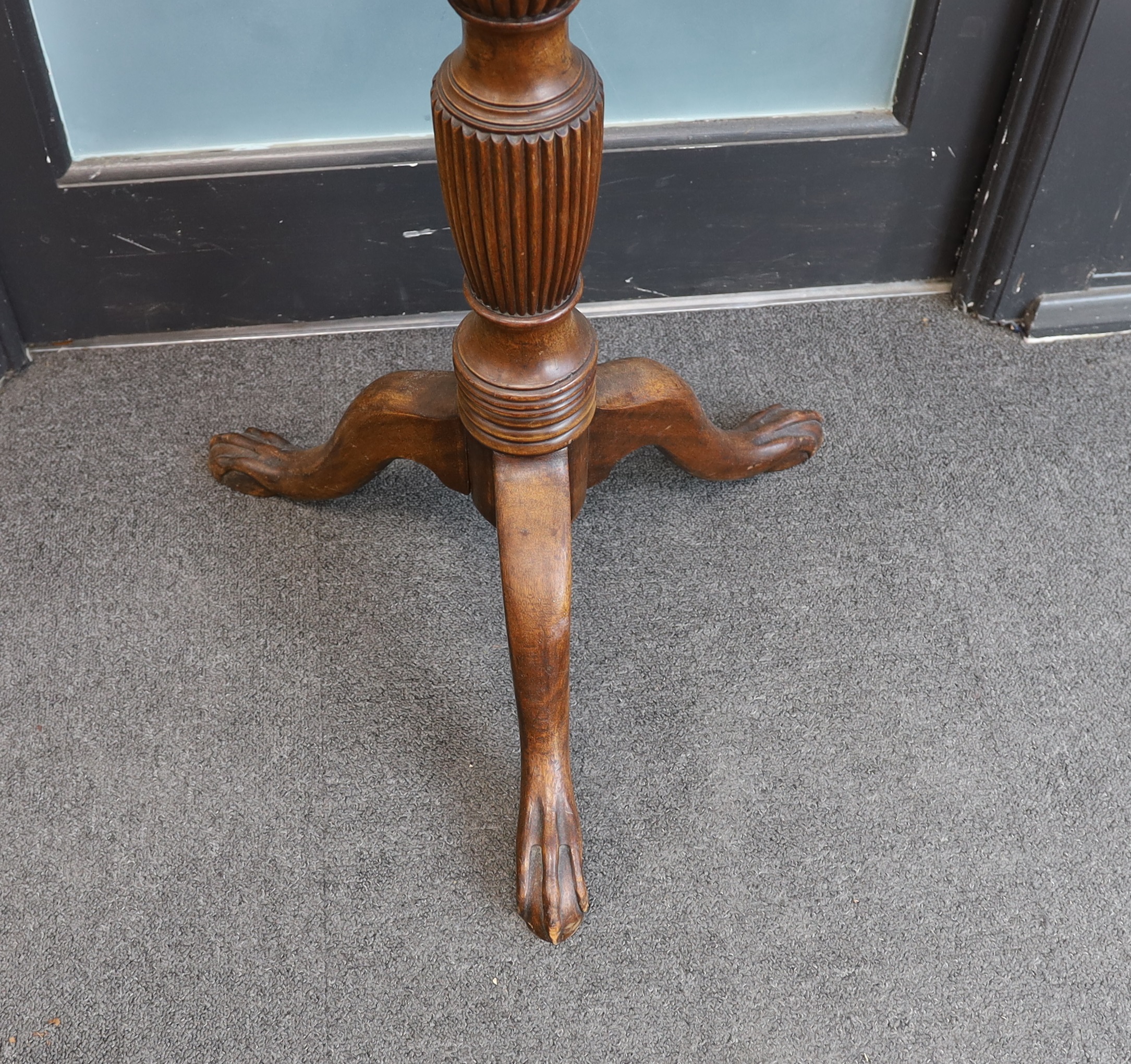 A George III style mahogany torchere, height 136cm